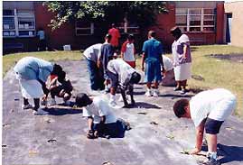 4-H Youth Working on a Garden Project at a Local Elementary School