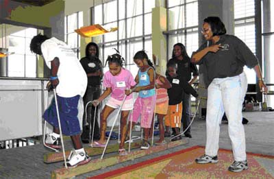 Agents Conducting Activities
with Youth at Shelter