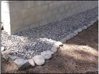 The Area Within Five Feet of
Structures Must Be Noncombustible. Gravel Mulches or Grasses Can Be
Used to Prevent Erosion