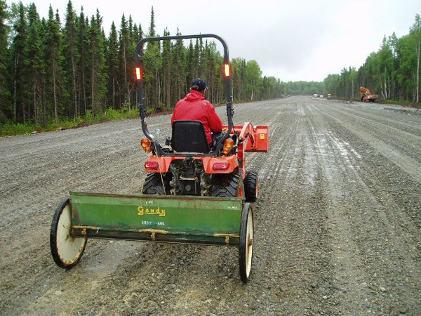 Planting the Talkeetna Demonstration Runway in August of 2008. Photo by Tim Evers.