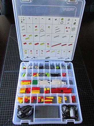 Opened Parts Tray with WeDo Parts and Parts Organization Key Card